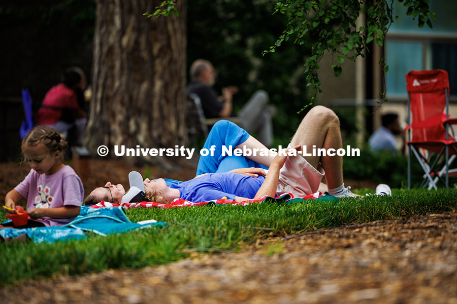 250625_Jazz_In_June_271.jpg Spectators lay on their backs looking up at the sky during the intermission of Sam Greenfield’s pe