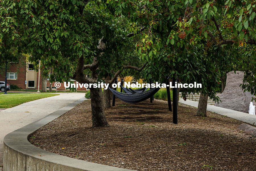 250716_City_Campus_656.jpg Hammocks sit empty by the Nebraska Union plaza. Summer on City Campus. July 16, 2025.