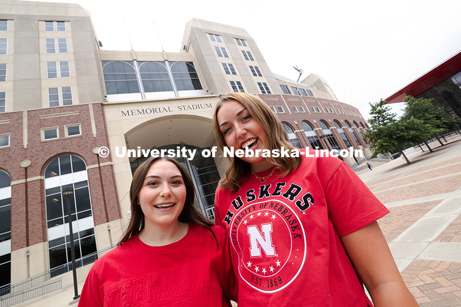 250716_PSA_Haring_3071.jpg Sisters Madison and Lauren Haring outside of Memorial Stadium. The Haring family was featured in the
