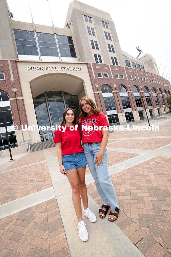 250716_PSA_Haring_3075.jpg Sisters Madison and Lauren Haring outside of Memorial Stadium. The Haring family was featured in the