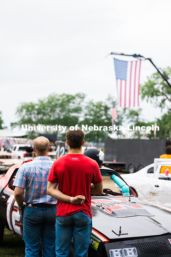250717_Engineering_7992.jpg Jace Grunden (left) and Ayden Shook (right) face the American flag while the national anthem played