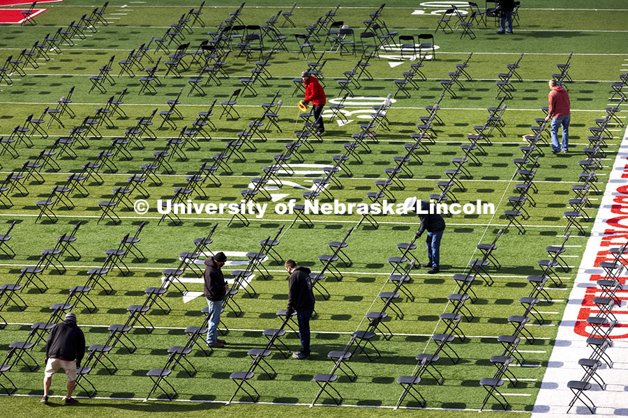 Chairs are set up on Tom Osborne Field in Memorial Stadium for Saturday’s commencement. May 6, 202