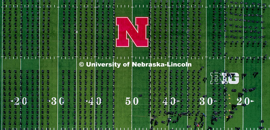 Chairs are set up on Tom Osborne Field in Memorial Stadium for Saturday’s commencement. May 6, 202
