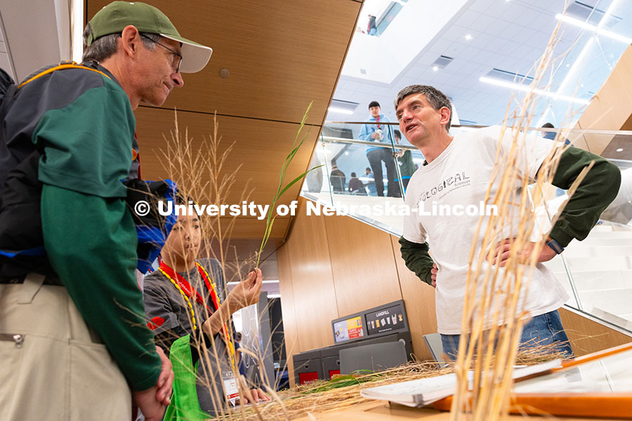 250523_Science_Olympiad_8971.jpg Chad Brassil, an Associate Professor in the School of Biological Sciences, speaks with Gordon Wood a