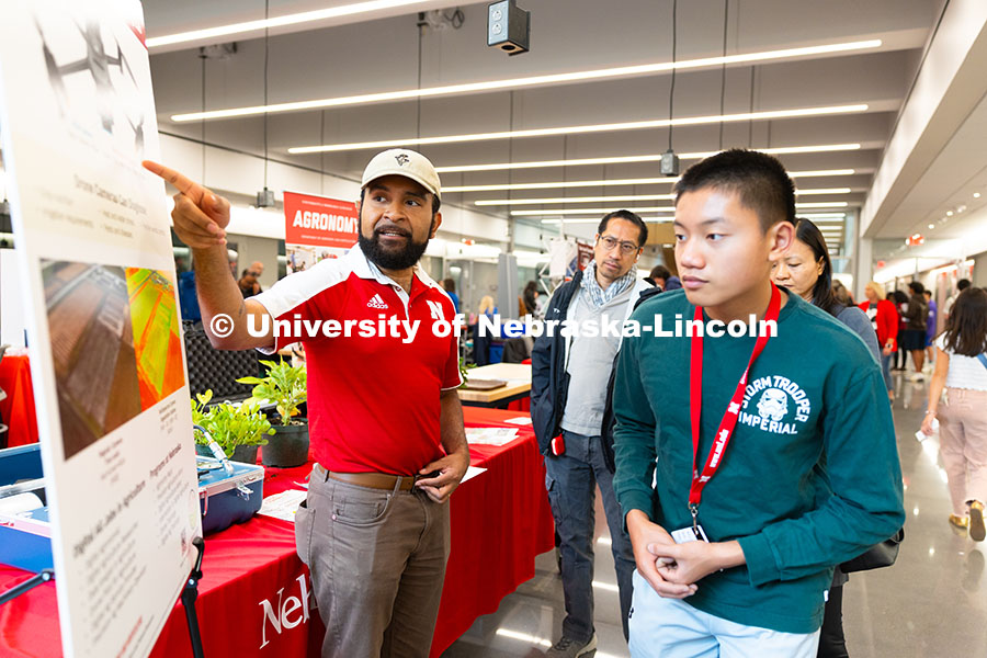 250523_Science_Olympiad_9009.jpg Aldi Airori, research technologist in the department of agronomy and horticulture, speaks with Natha