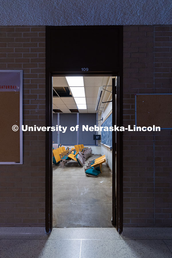 Rows of old chairs peek out of room 109 as the old part of Westbrook Music Building is cleared out b