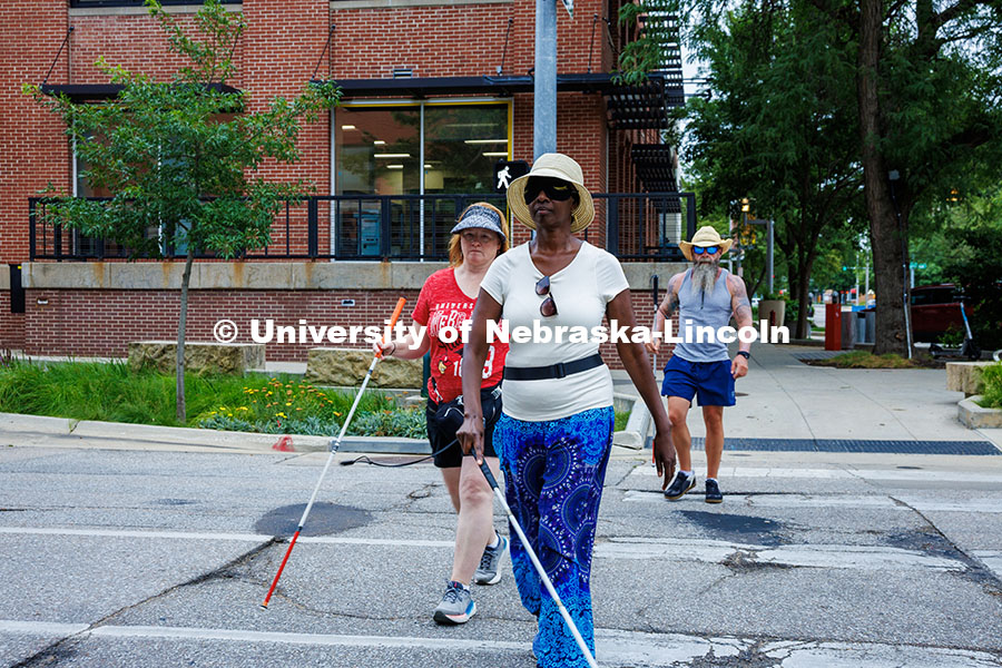 250722_Mobility_Orientation_418.jpg Sharon Cherono orientates through a crosswalk using her long cane during the mobility and orientatio