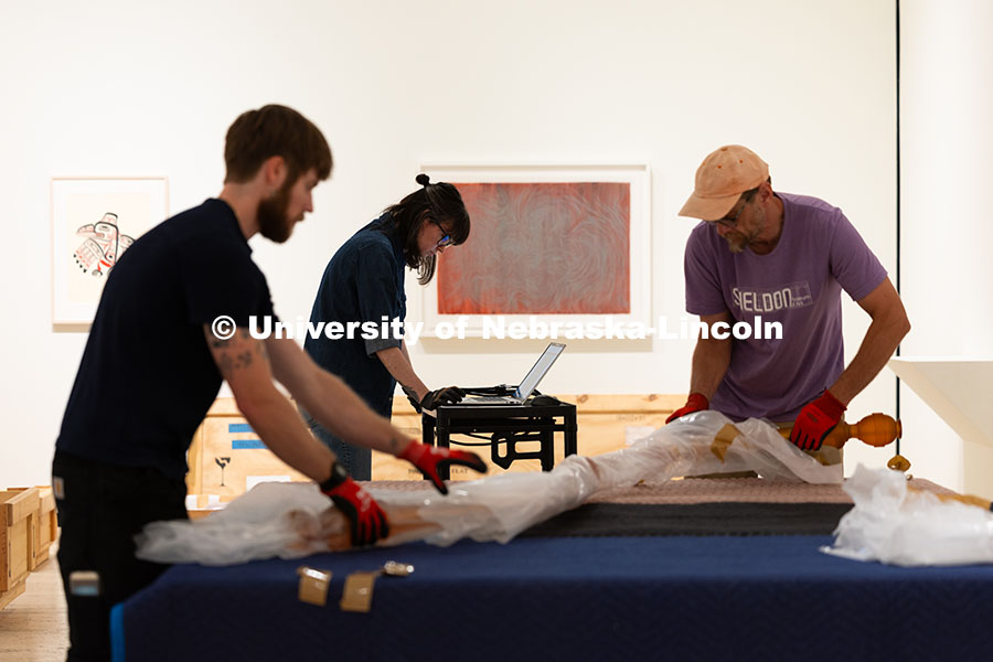 250729_Sheldon_3039.jpg Natalie Yates, Associate Registrar for Collections and Exhibitions, checks a diagram of Niho Kozuru'
