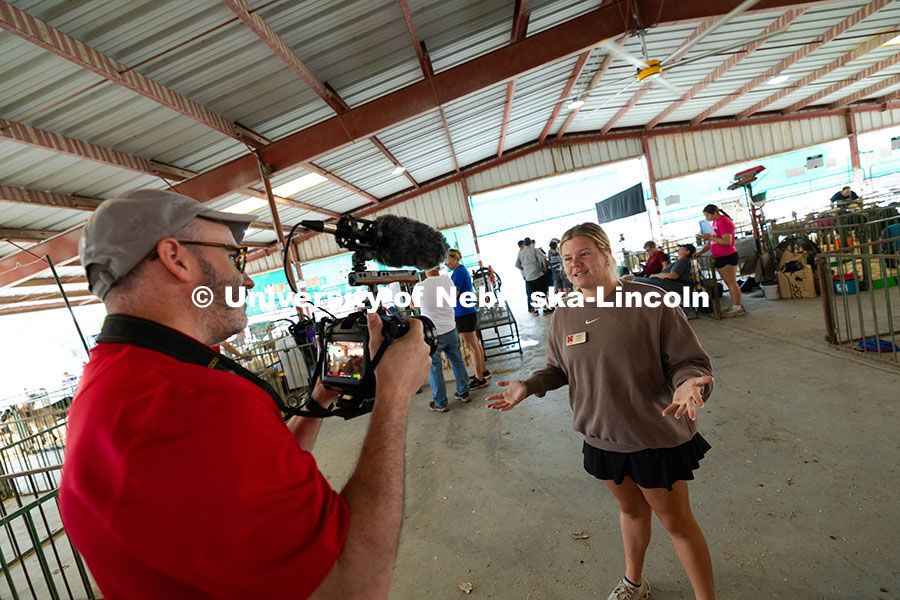 Kristen Herrick, 4-H Extension Assistant, is interviewed by Aaron Nix of University Communication du