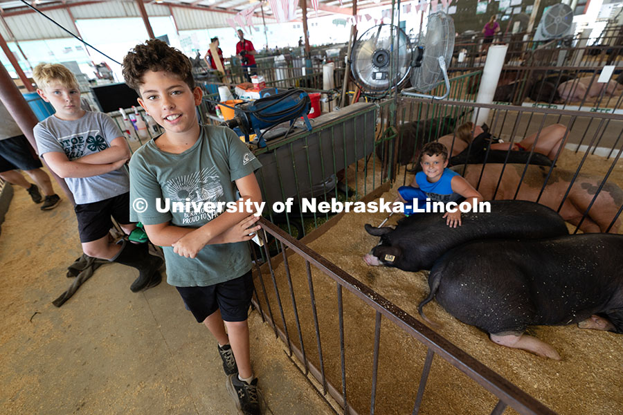 250731_Otoe_Fair_3264.jpg Trent Stubbendick, 12, from Avoca, poses with his friends Elliot Johnson, 12, from Unadilla (left),