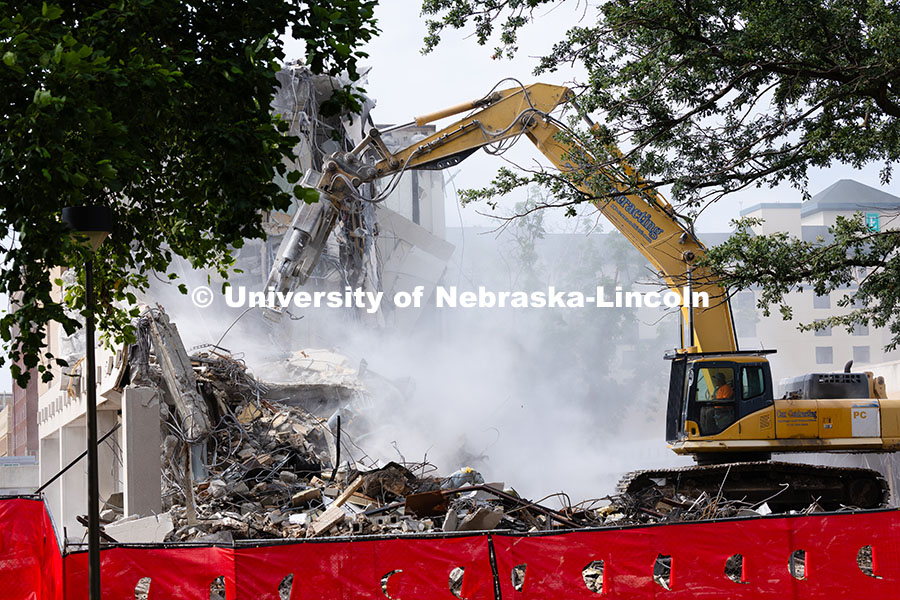 250805_Westbrook_3211.jpg A concrete pulverizer attachment is used on an excavator to break apart the former Westbrook Music B