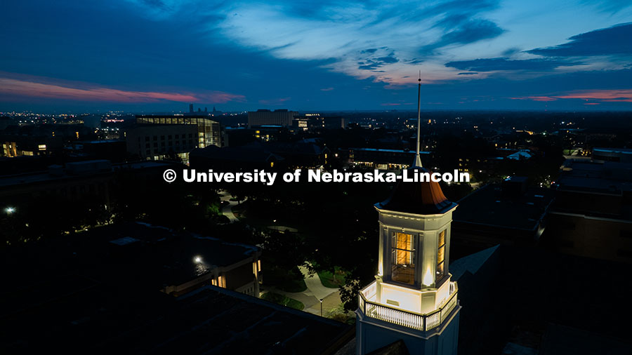Aerial view of UNL's Love Library cupola and City Campus at dawn. August 12, 2025. 