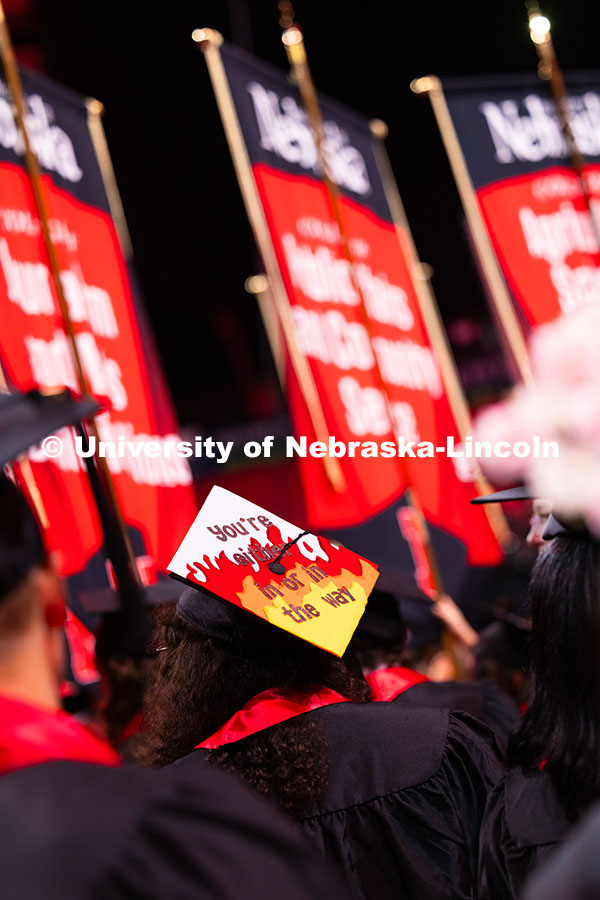 250816_Commencement_3537.jpg A graduate's cap reads "you're either in or in the way" during the summer commencement ceremony. Sum
