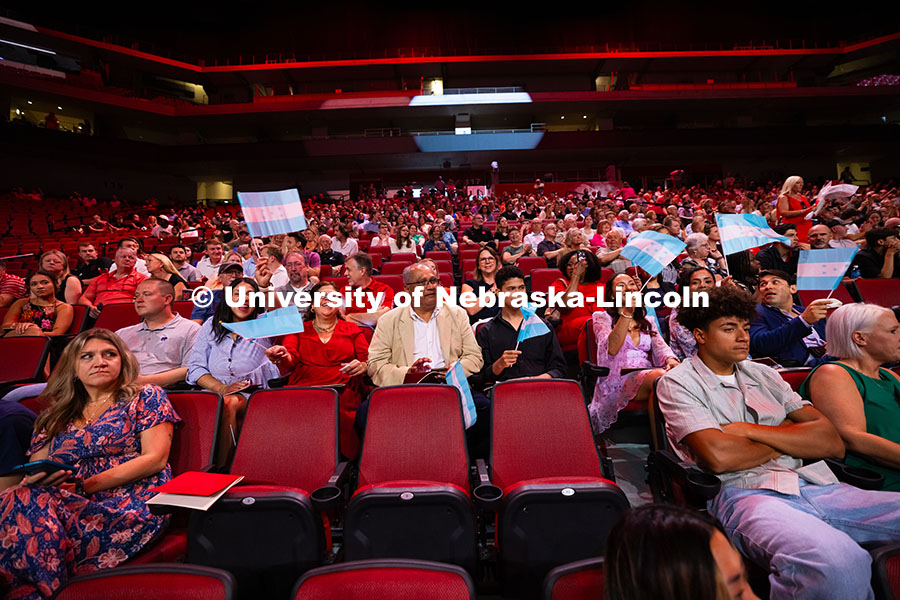 250816_Commencement_3720.jpg Family members wave Honduran flags to the beat of "There is No Place Like Nebraska" as the recession