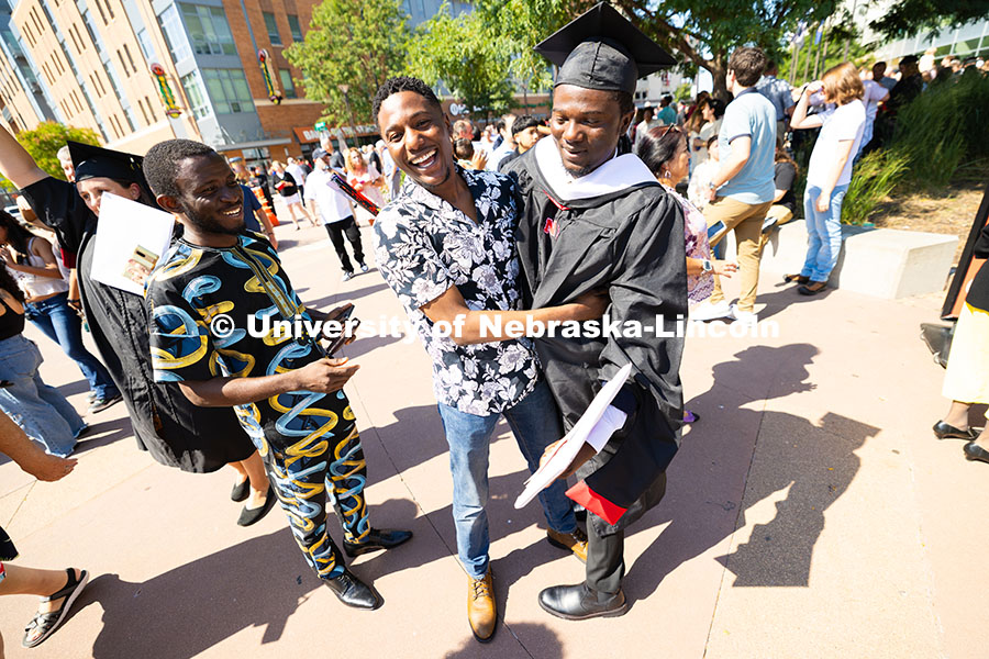250816_Commencement_3770.jpg Oluseye Fakinlede is hugged by his brother after meeting up outside of Pinnacle Bank Arena. Fakinled