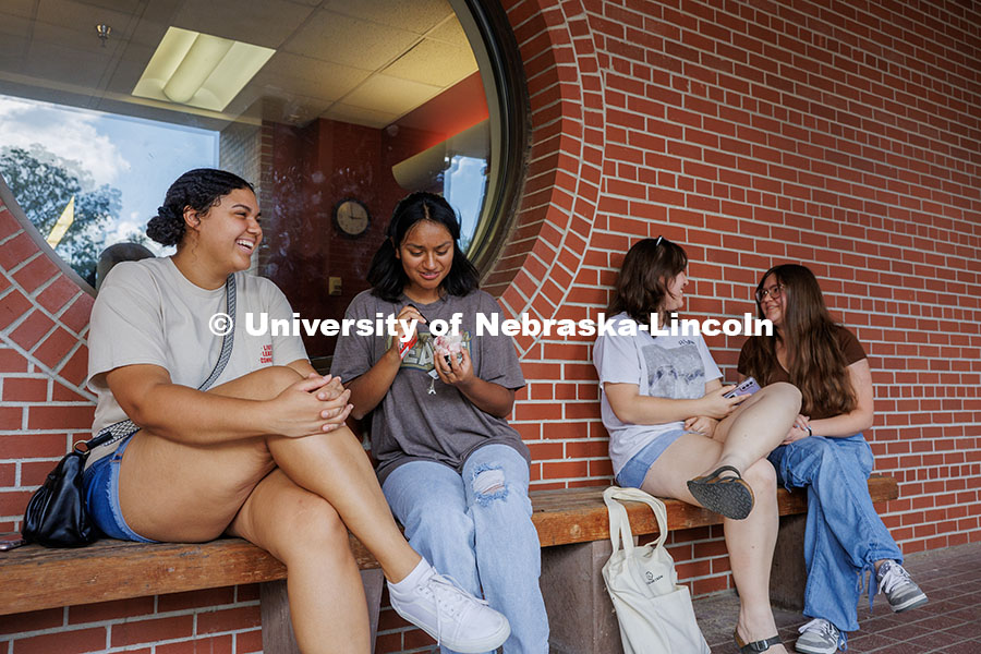 250820_East_Ice_Cream_031.jpg McKenzie Fuller, Jennifer Gamez Martinez, Meghan Harrington and Adeliya Ivaniv (left to right) sit t