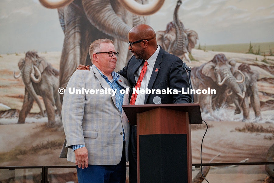 250821_Zeleny_Farewell_425.jpg Mike Zeleny and Chancellor Rodney D. Bennett hug during Zeleny’s farewell reception in Morrill Hal