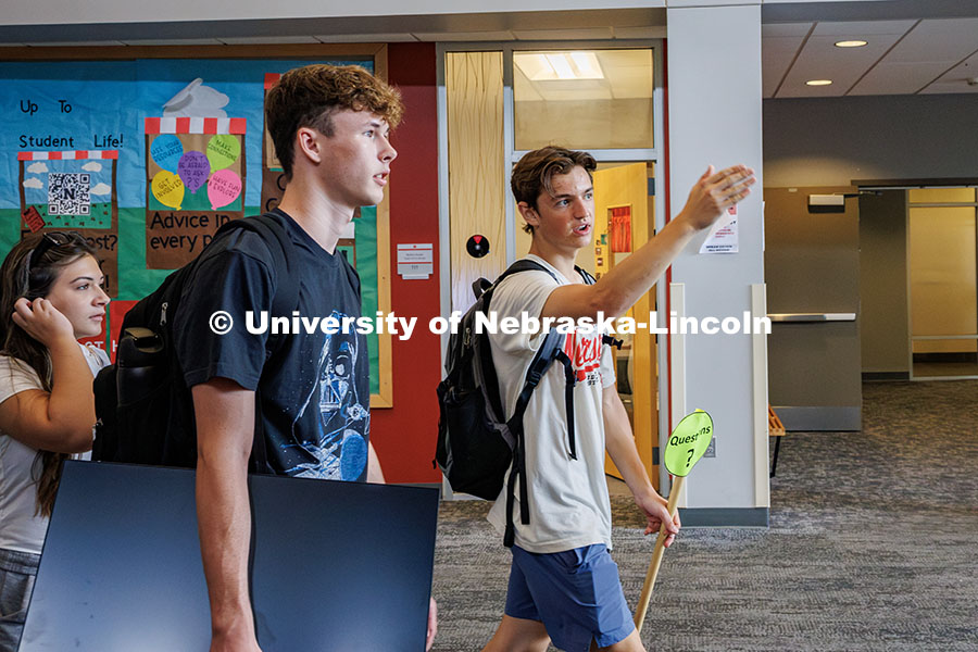 Riley Bry (right) a senior Sports Media and Communication/Broadcasting major and RA helps guide stud