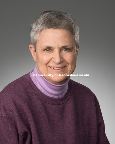 Studio portrait of Carole Goebes, Library faculty/staff photo for web. May 4, 2016. 