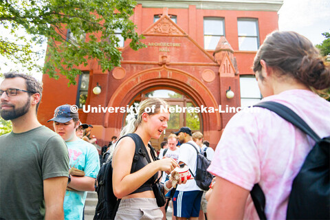 Students enjoy some Dairy Store ice cream at the College of Architecture Ice Cream Social outside of