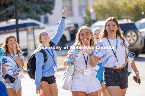 Maddie Kirk and Sophie Ackerman wave as they walk to the next event. Sorority Recruitment. August 15