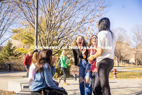 Group of friends sit and chat outside of the Union on City Campus. February 20, 2024. 