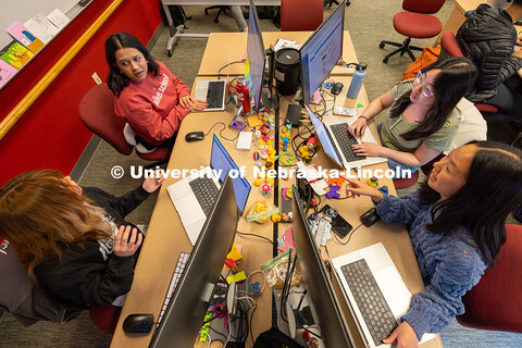 A Raikes School Design Studio team works on creating an AI program for Nebraska-based clothing retai