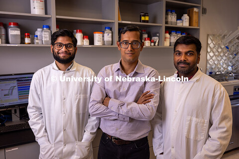 Sunil Sukumaran, (center) Assistant Professor of Nutrition and Health Sciences poses with postdoctor