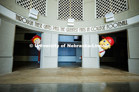 (Left) Brady Moylan as Herbie and Ben Hastreiter as ‘Lil Red peeks behind a column in Memorial Sta
