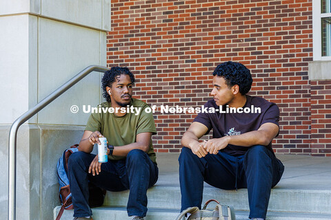 (Left) Senior, Mohamed Elimam, and Junior, Sayid Alsayid, sit outside the City Campus Union having a