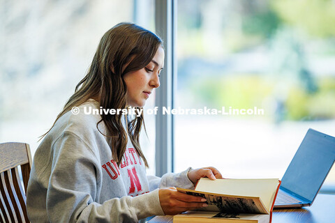 Lauren Haring, a junior Management major, studies in Love Library North. April 07, 2025. 