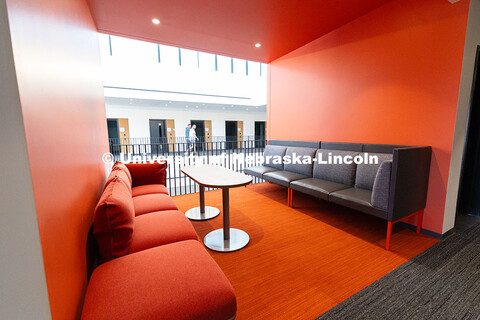 Couches line an alcove overlooking the central lobby of the new Hixson-Lied College of Fine and Perf