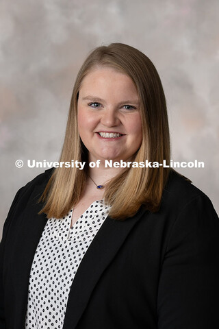 Studio portrait of Paige Kristensen, Assistant Director of Development at the University of Nebraska