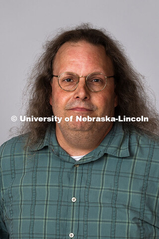 Studio portrait of Dan Hutt, Senior Program Coordinator for the Center for Academic Success and Tran