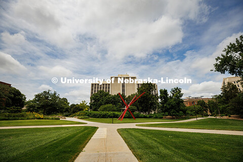 Five sidewalks intersect near the Old Glory sculpture on City Campus in the summertime. Summer on Ci
