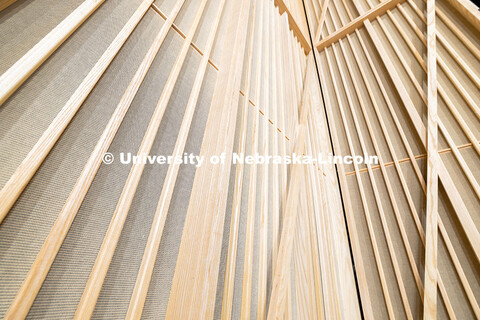 Wood and fabric panels line the walls of what will be an interactive performance space in the new Fi