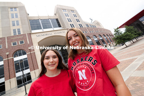 Sisters Madison and Lauren Haring outside of Memorial Stadium. The Haring family was featured in the