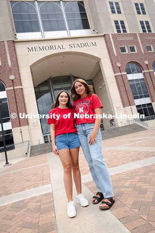 Sisters Madison and Lauren Haring outside of Memorial Stadium. The Haring family was featured in the