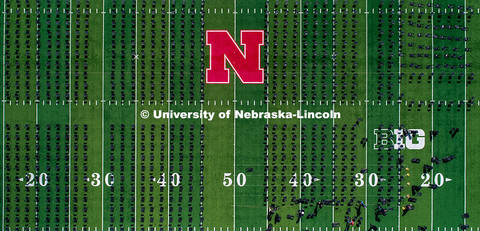 Chairs are set up on Tom Osborne Field in Memorial Stadium for Saturday’s commencement. May 6, 202