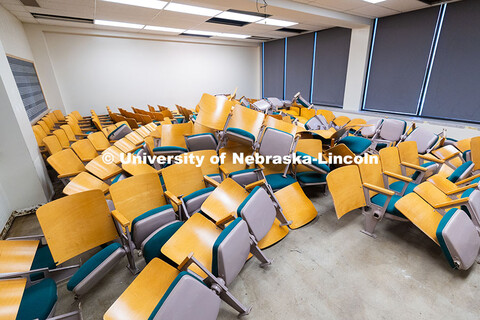 Chairs from a lecture hall sit in a pile. These were the "loudest chairs for the quietest performanc