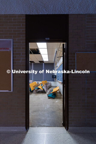 Rows of old chairs peek out of room 109 as the old part of Westbrook Music Building is cleared out b