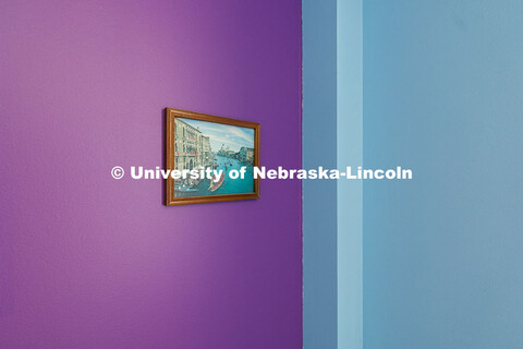 A picture of Venice is the only item remaining in a colorful former faculty office on the second flo