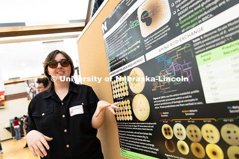 Quin Barton, a UNL senior studying biology, presents during the Summer Research Symposium. August 5,