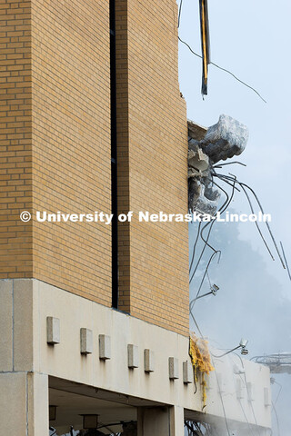 Heavy equipment pulls down concrete, brick and rebar during the demolition of Westbrook Music Buildi