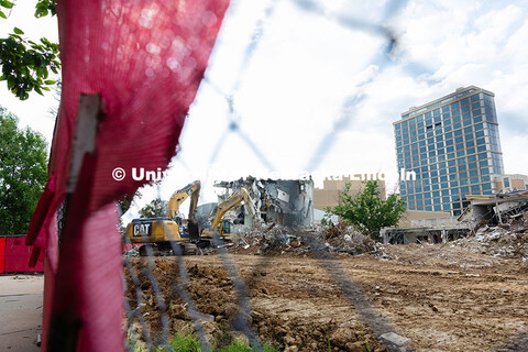 Excavators move debris from the site of the former Westbrook Music Building as the last of the north