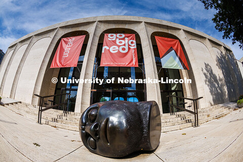 Signs hanging outside the Sheldon Memorial Art Gallery for the Go Big Red Exhibition. Summer on City