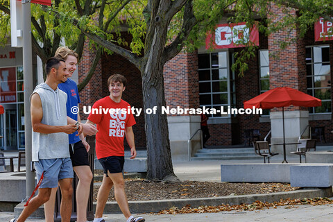 A group of friends walk in the Union Plaza during Big Red Welcome Week. Big Red Welcome campus tours