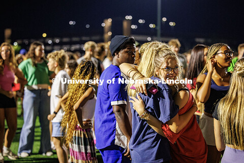 Students hug each other as they meet up during Playfair. More than a thousand students gather on the