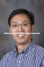 Studio portrait of Li Rong Zeng, Assistant Professor, Plant Pathology,  August 20, 2014. 