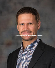 Studio portrait of Justin Bradley, New Faculty Photo Shoot, August 19, 2015. 